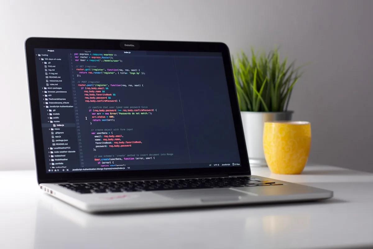 Code on a laptop screen in a dark room — how a full-stack developer won a $4,200 contract from a $2.45 BidPropel credit