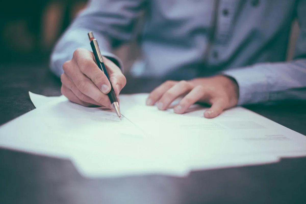 Checklist on a desk — the 10-point Upwork proposal quality check freelancers use before sending